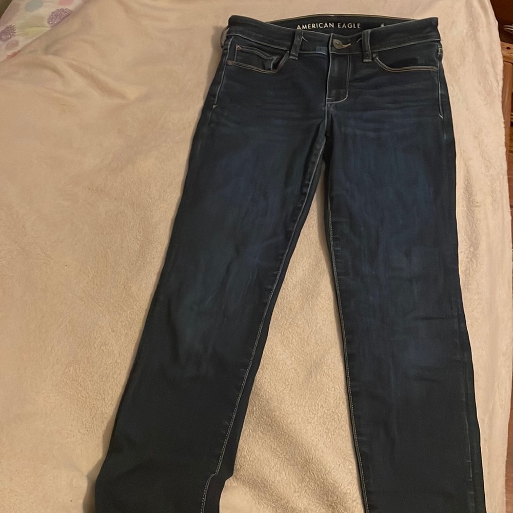 Medium wash low rise skinny jeans